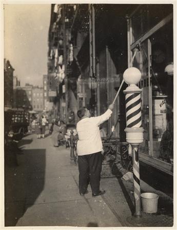 (LOWER EAST SIDE--NEW YORK CITY) Album containing 62 photographs of the Lower East Side by an unidentified photographer who has a keen